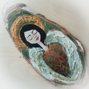 Anioł na drewnie zielony