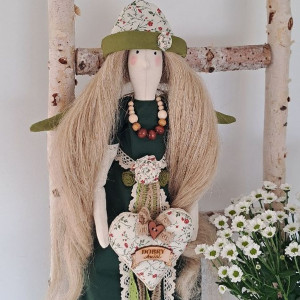 anioł stróż w butelkowej zieleni