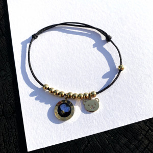 Bransoletka na czarnym sznureczku z niezapominajką