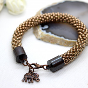 bransoletka ze szklanych koralików ze słonikem
