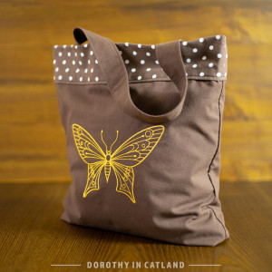 Brązowa torba w kropki – z żółtym motylem