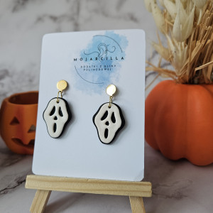 Wiszące kolczyki krzyk