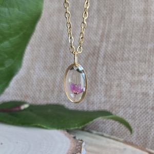 Złota zawieszka jajowata różowa żywica