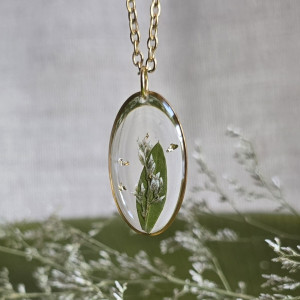 Złota zawieszka jajowata zboża prawdziwe rośliny