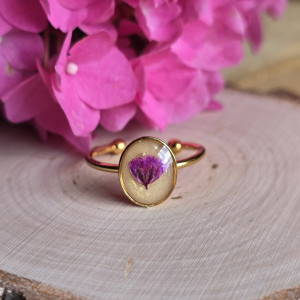 Złoty pierścionek z magicznym kwiatem jajowaty